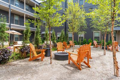 Courtyard with Fire Pit and Adirondack Chair